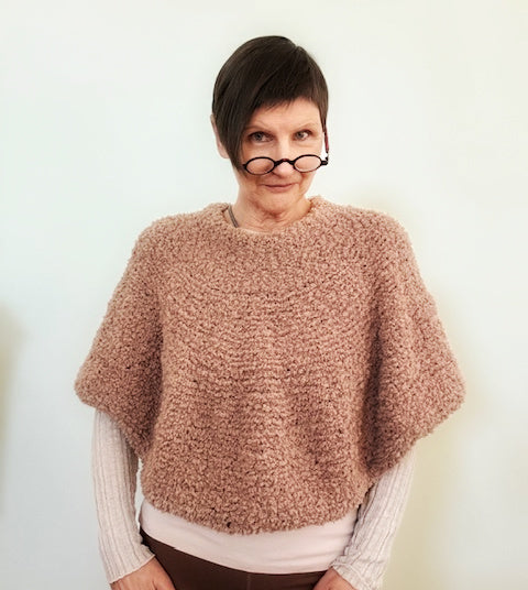 Fuzzy poncho, 25% off